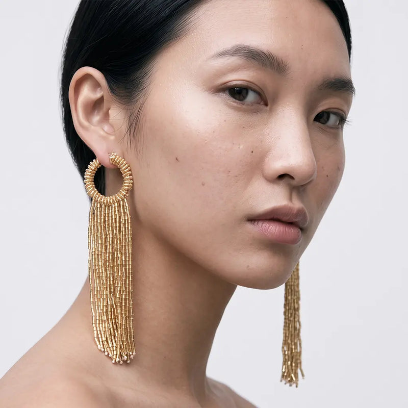 gold-beaded-tassel-earrings