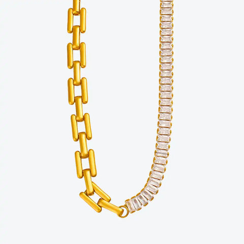 Gold chain and diamond necklace on a white background