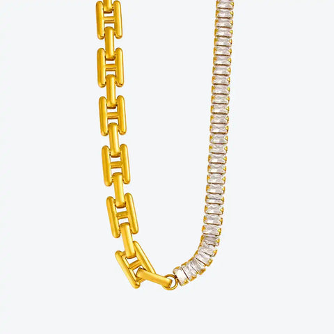 Gold chain with diamond-studded links on a white background