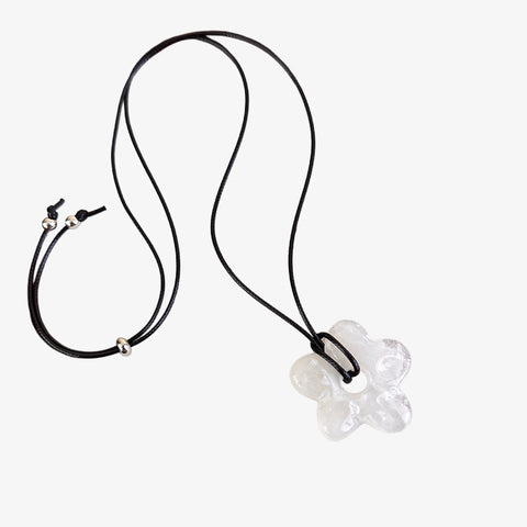 White earbud case with black lanyard on a white background