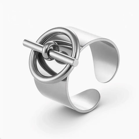 Silver ring with a unique design on a white background