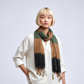 Gradient scarf with green and beige colors on a white background